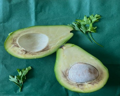 Fresh green healthy food ingredients avocado herbs